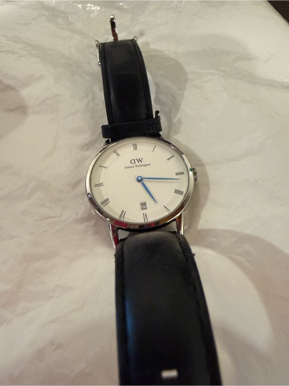Daniel Wellington White Dial Watch with Black Strap and Blue Hands